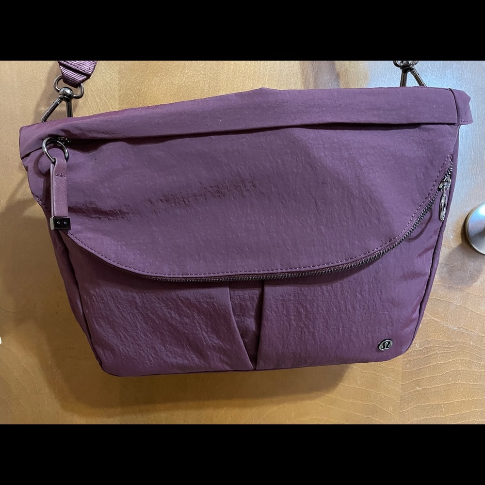 Gently used Lululemon All Night Festival Bag 10L Cassis with matching wallet